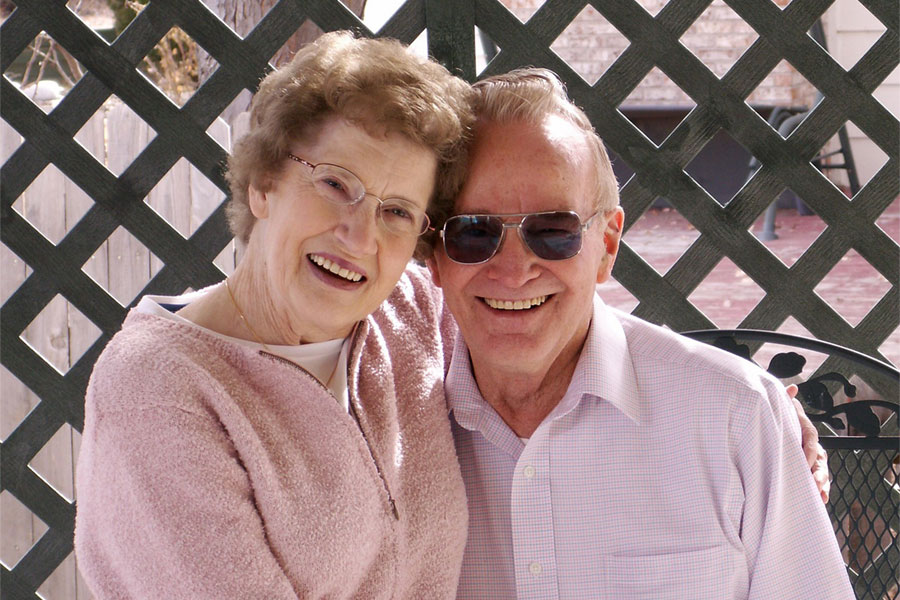Elder couple smiling because they have Medicare health insurance
